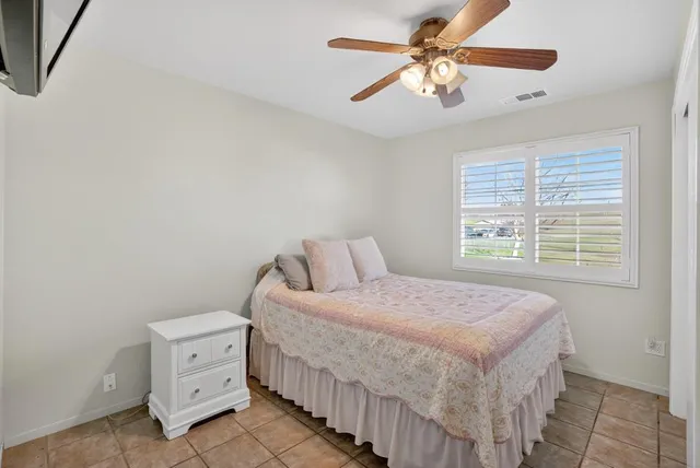 a room with furniture and a chandelier