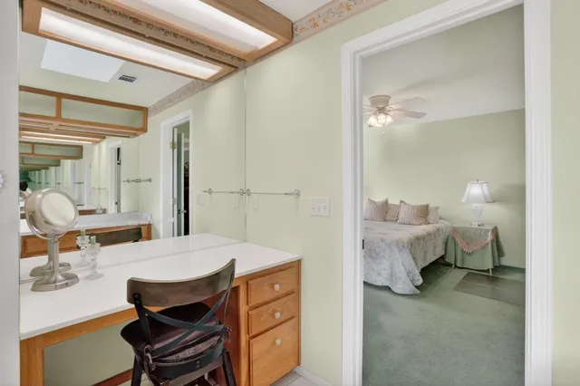 a view of a lake with a building in the background