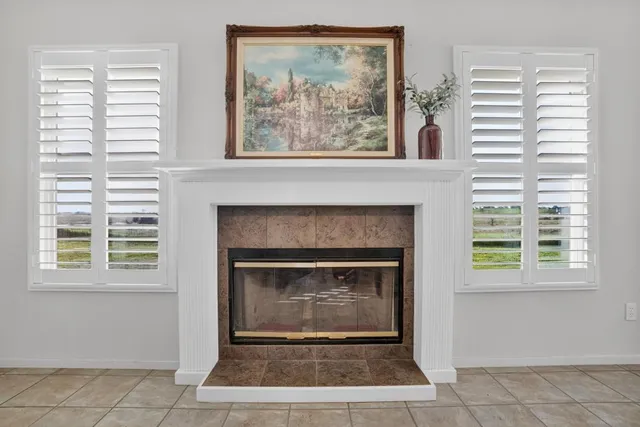 a kitchen with a refrigerator and cabinets