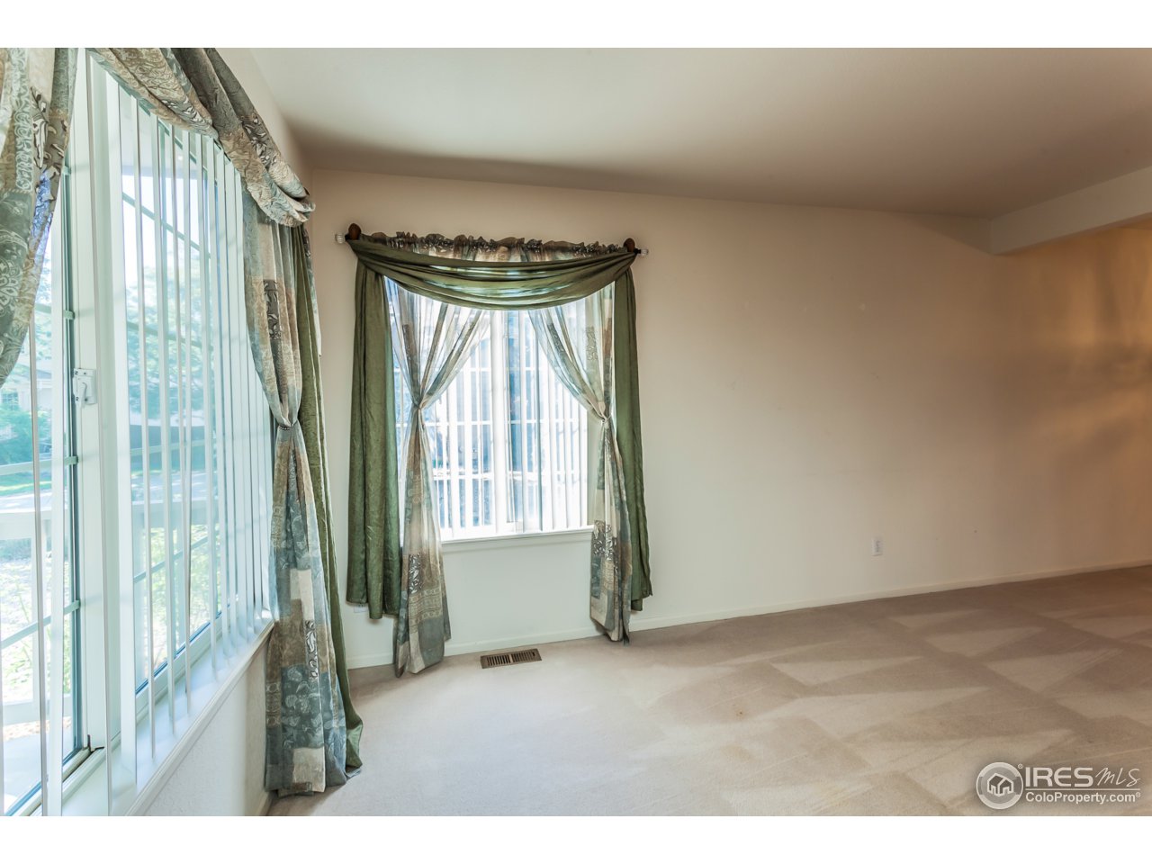 607 Rider Ridge Road Longmont, CO 80504 - Photo 9 of 30 a view of an empty room and window