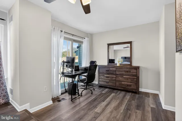 a room with a desk and chair