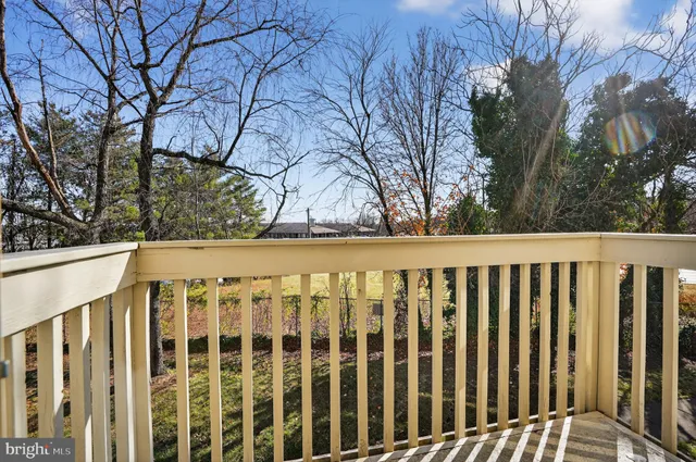 a view of a wooden fence
