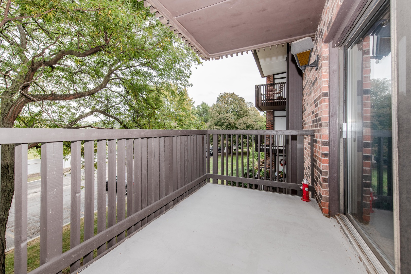 1504 Woodbridge Road, Unit 2E Joliet, IL 60436 - Photo 13 of 34 a view of street from balcony