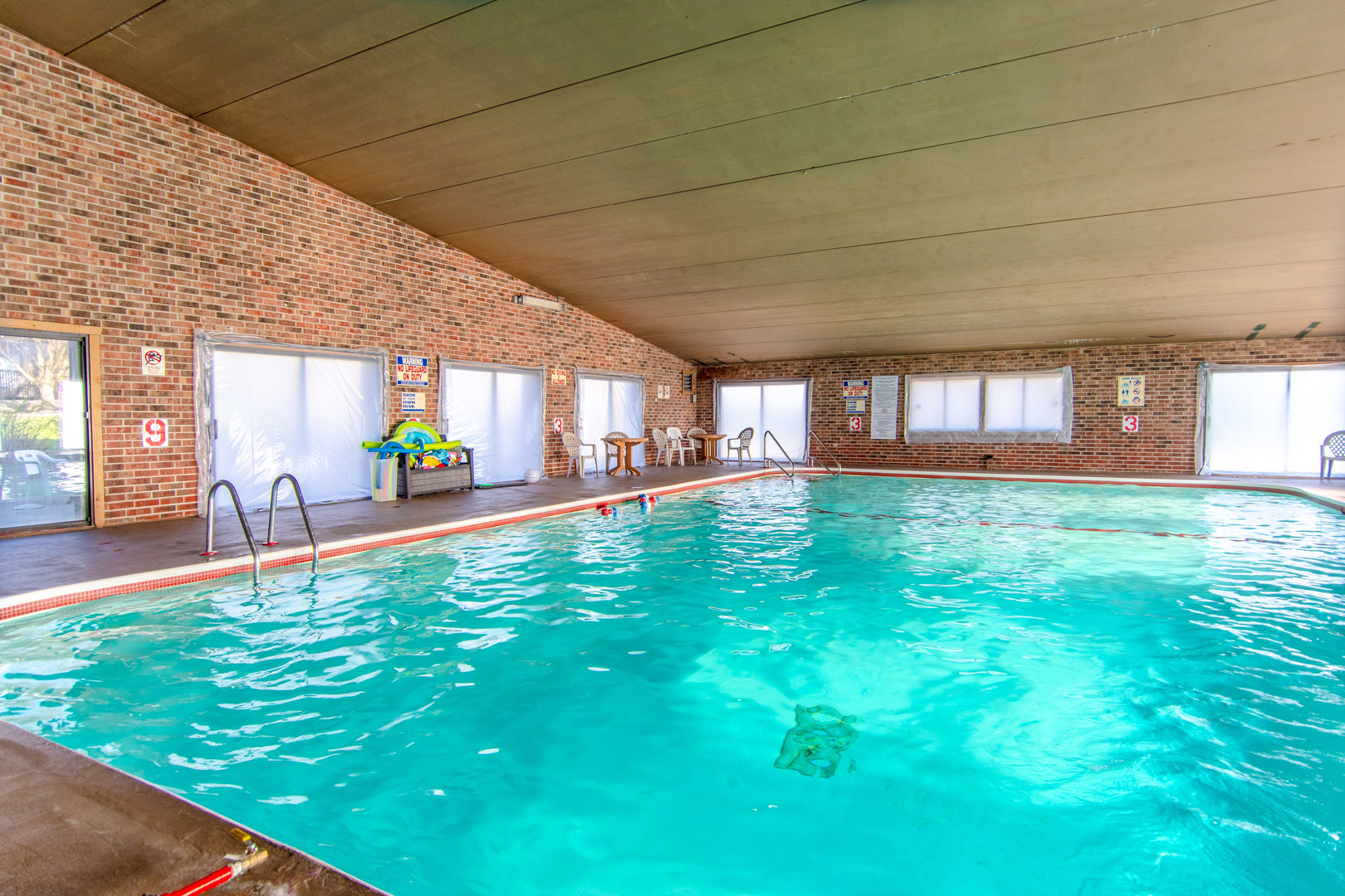 1504 Woodbridge Road, Unit 2E Joliet, IL 60436 - Photo 21 of 34 a porch with yard and outdoor seating