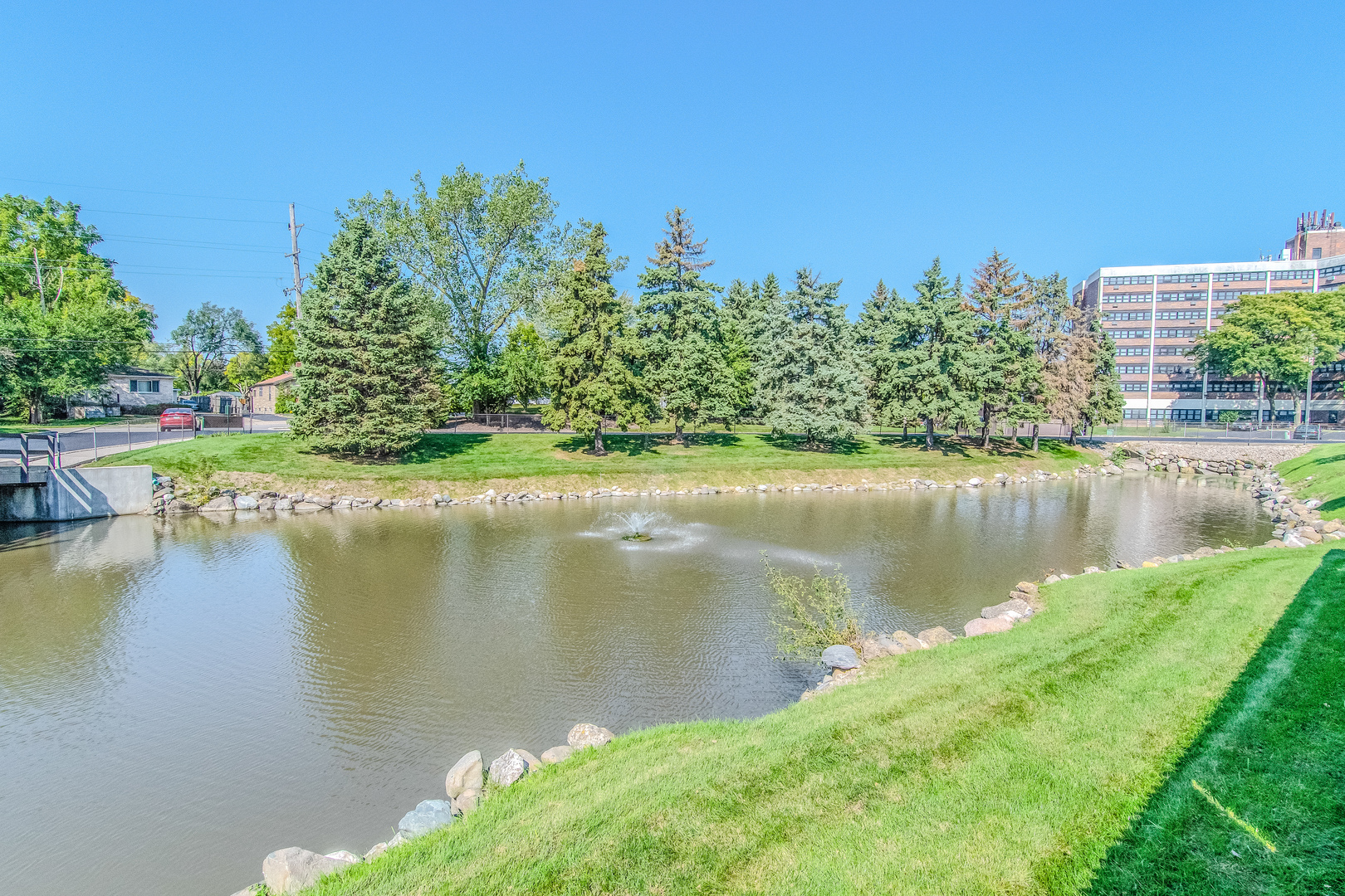 1504 Woodbridge Road, Unit 2E Joliet, IL 60436 - Photo 31 of 34 a view of a lake with a city