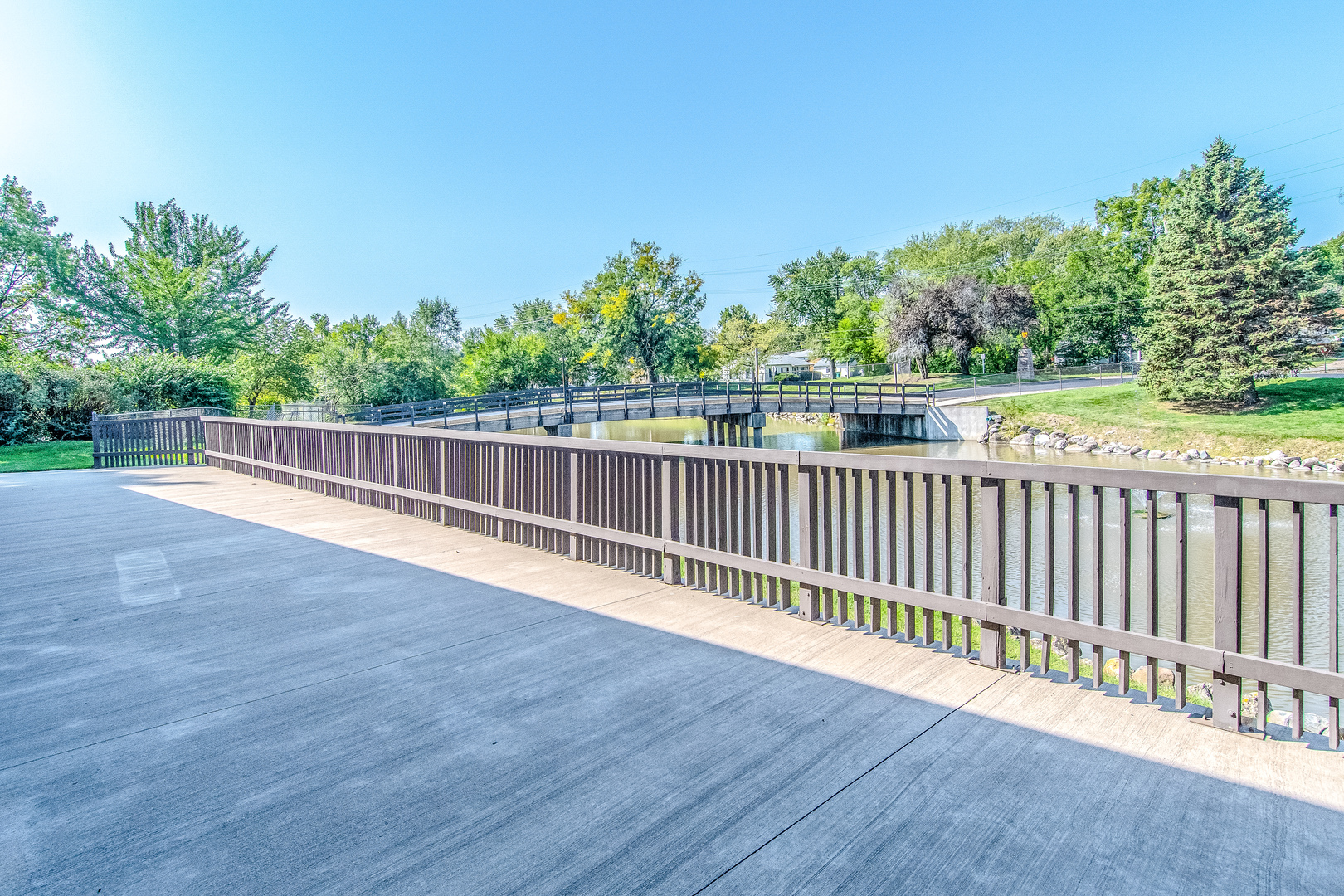 1504 Woodbridge Road, Unit 2E Joliet, IL 60436 - Photo 32 of 34 a view of a balcony with wooden floor