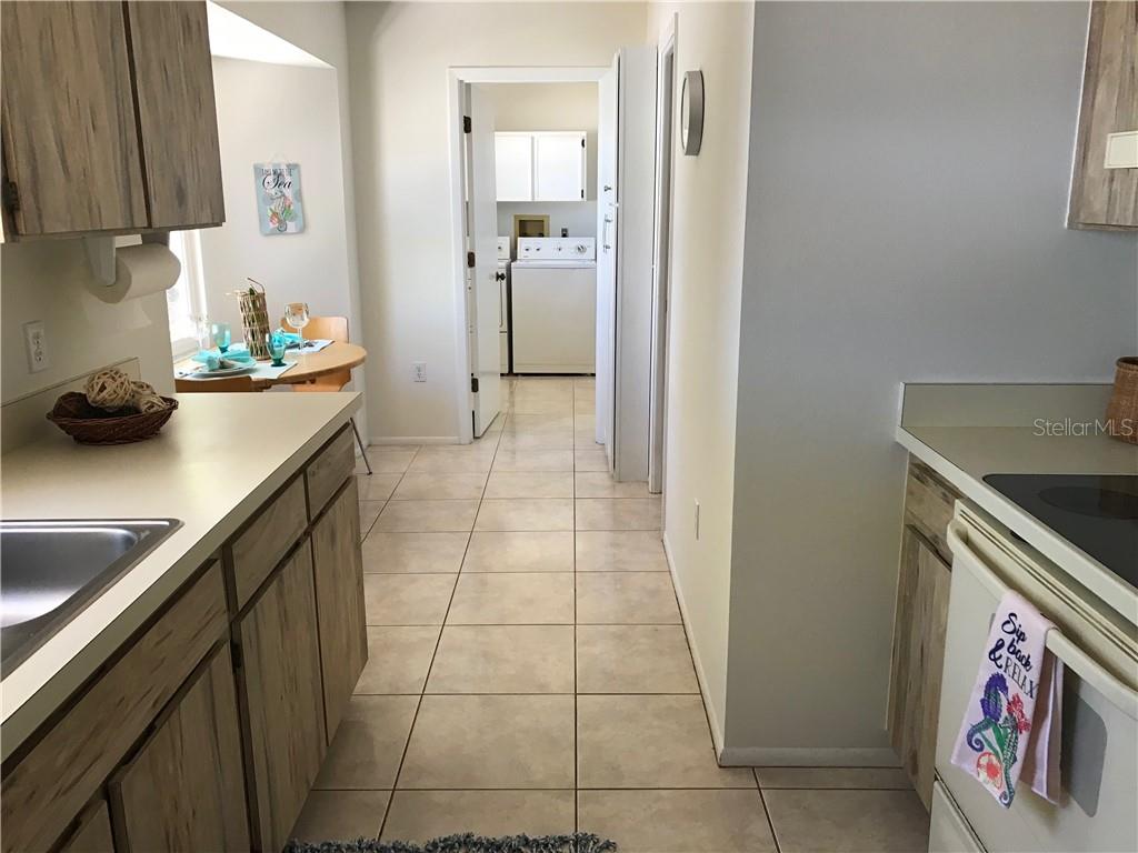 908 Royal Road Venice, FL 34293 - Photo 12 of 30 well equipped kitchen with eating nook