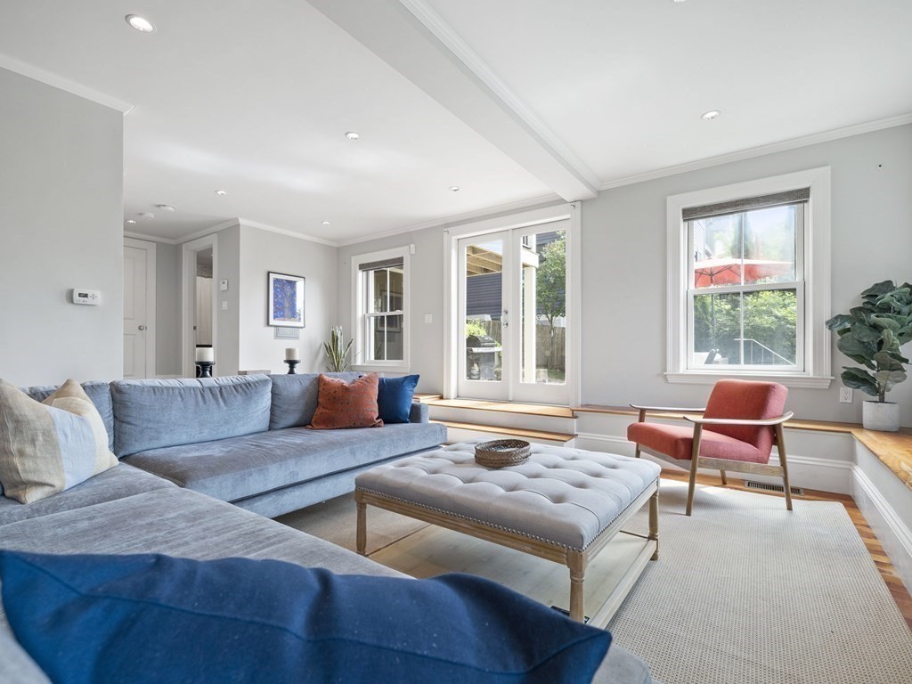99 Sedgwick Street, Unit 1 Boston, MA 02130 - Photo 14 of 41 a living room with furniture and a large window