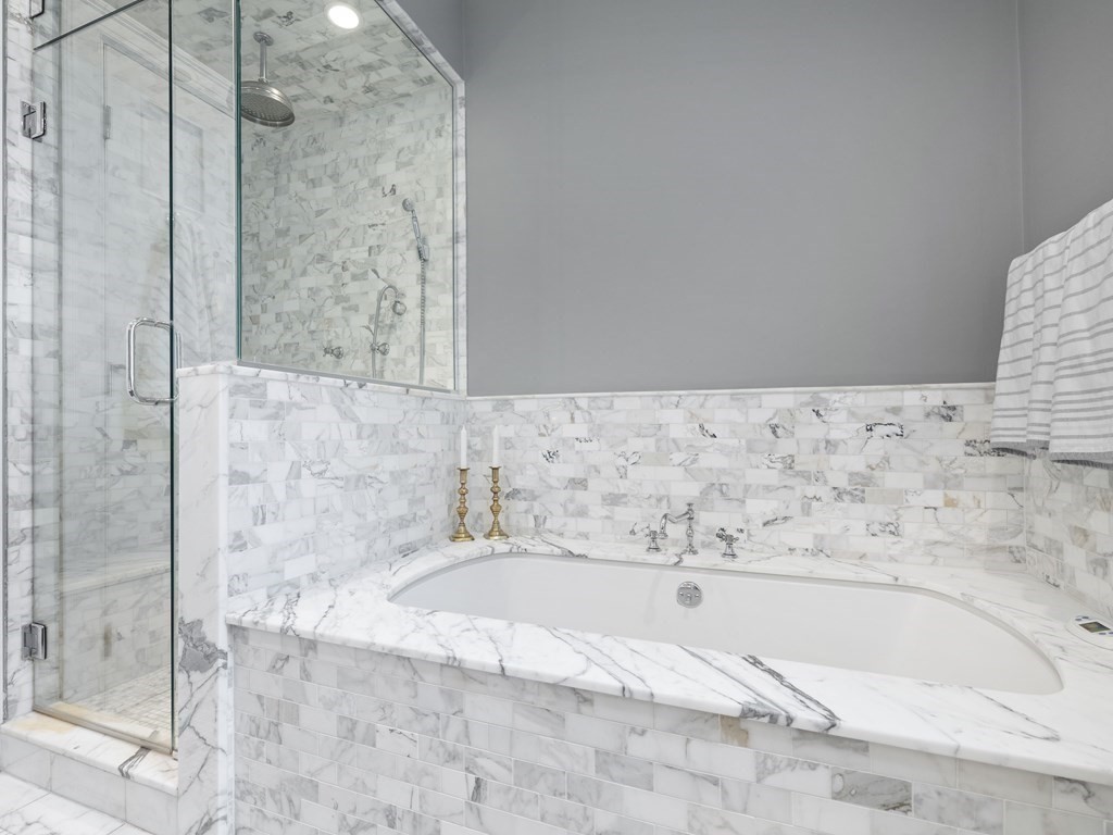99 Sedgwick Street, Unit 1 Boston, MA 02130 - Photo 23 of 41 a bathroom with bathtub and shower