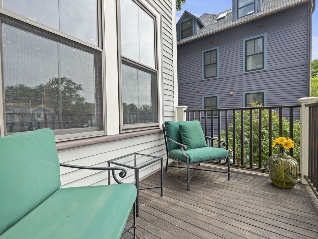 99 Sedgwick Street, Unit 1 Boston, MA 02130 - Photo 31 of 41 a house view with a seating space and a balcony