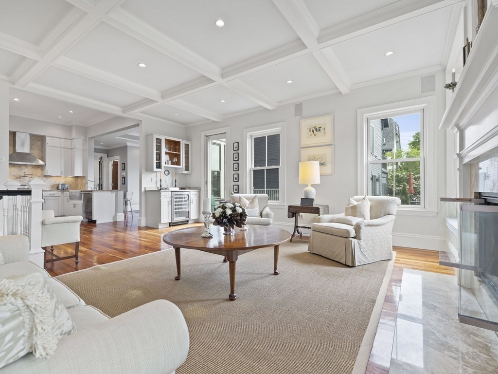 99 Sedgwick Street, Unit 1 Boston, MA 02130 - Photo 4 of 41 a living room with furniture and a large window