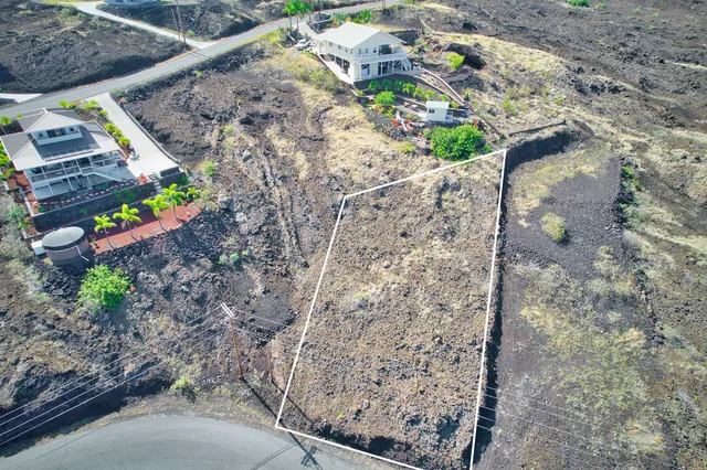 a view of balcony with wooden floor
