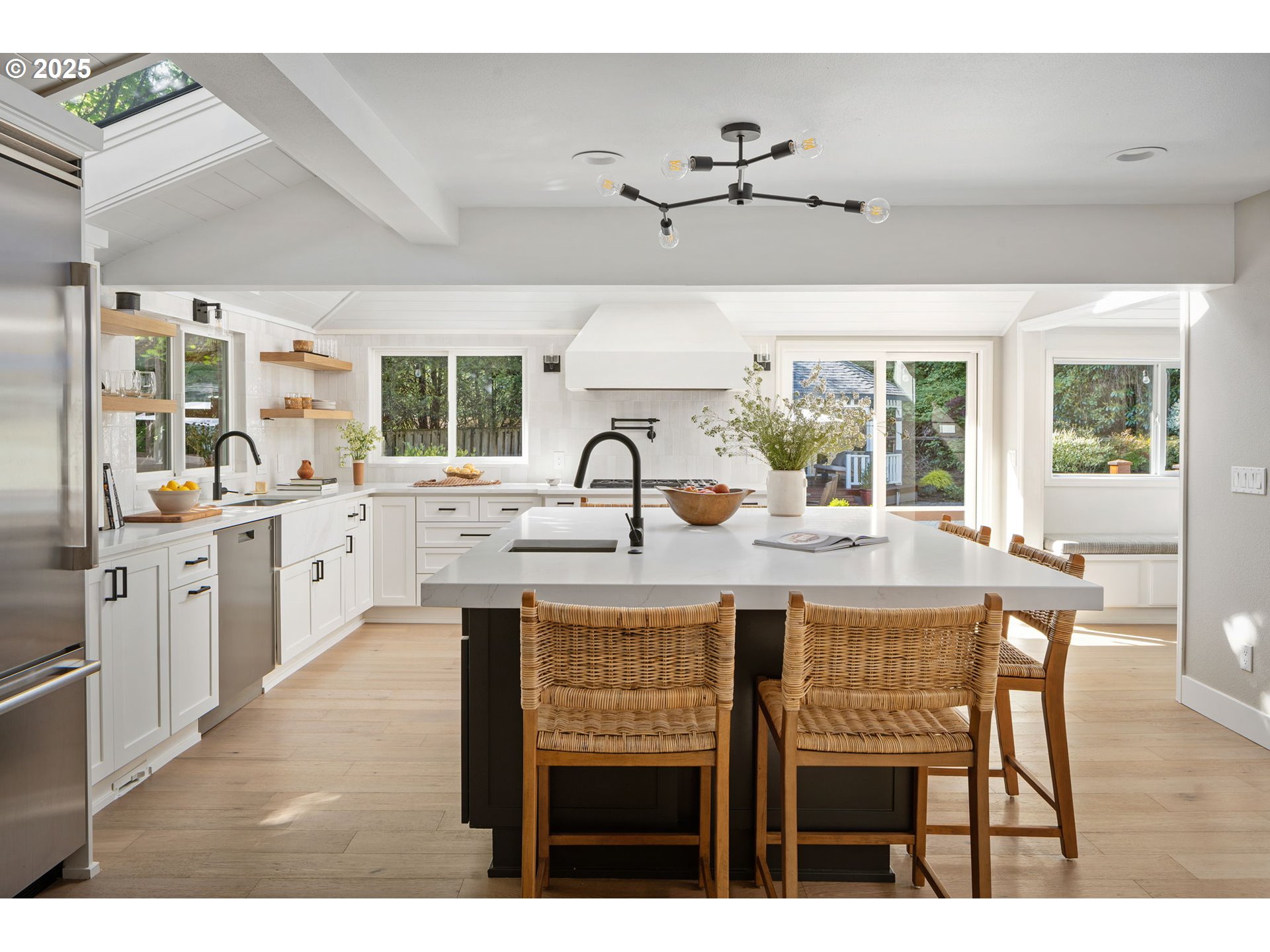 13740 Fielding Road Lake Oswego, OR 97034 - Photo 12 of 41 a open kitchen with stainless steel appliances kitchen island granite countertop a sink and cabinets
