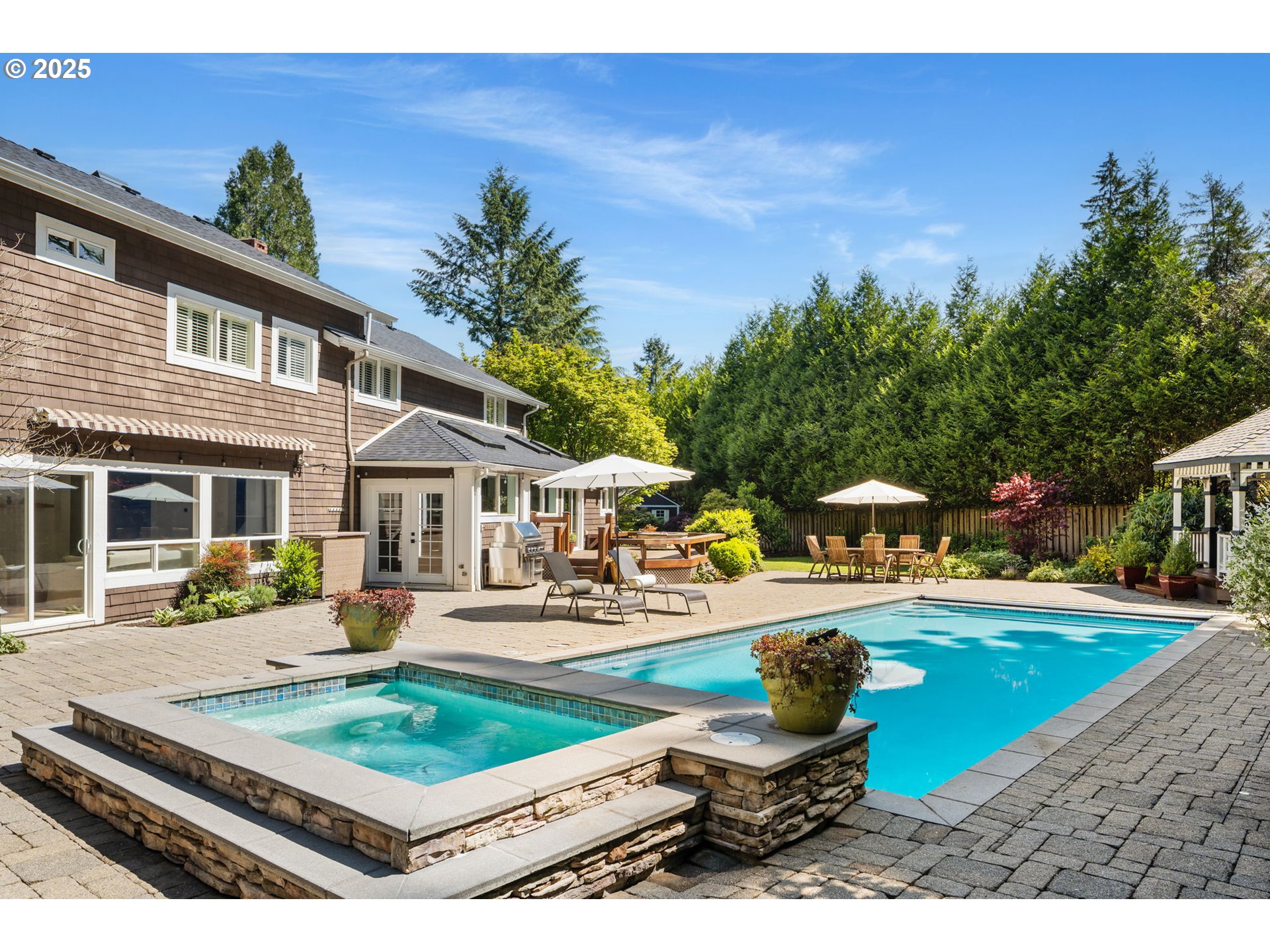 13740 Fielding Road Lake Oswego, OR 97034 - Photo 2 of 41 a front view of a house with garden