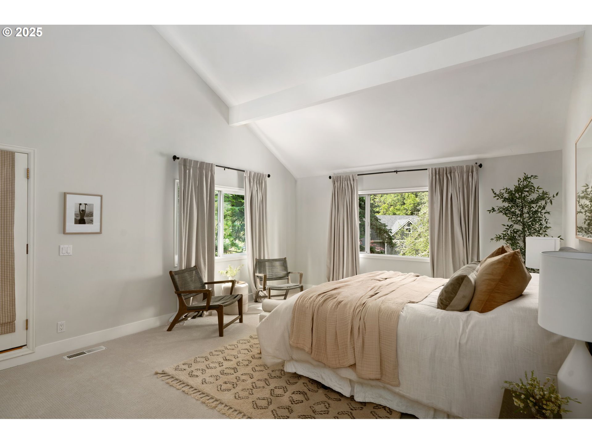 13740 Fielding Road Lake Oswego, OR 97034 - Photo 23 of 41 a bedroom with a bed and a window