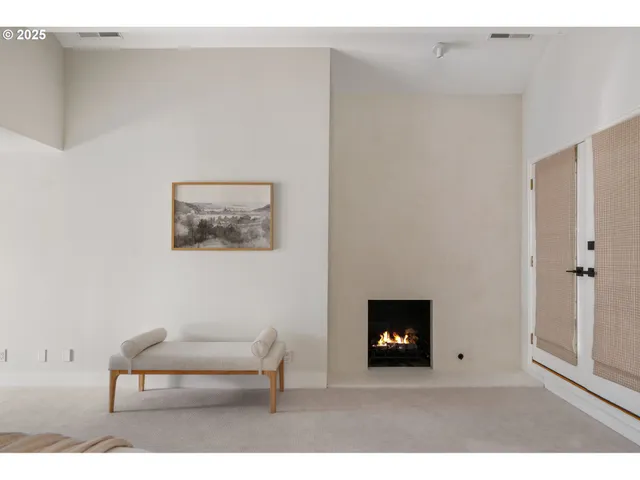 a bathroom with a granite countertop sink a mirror and a shower