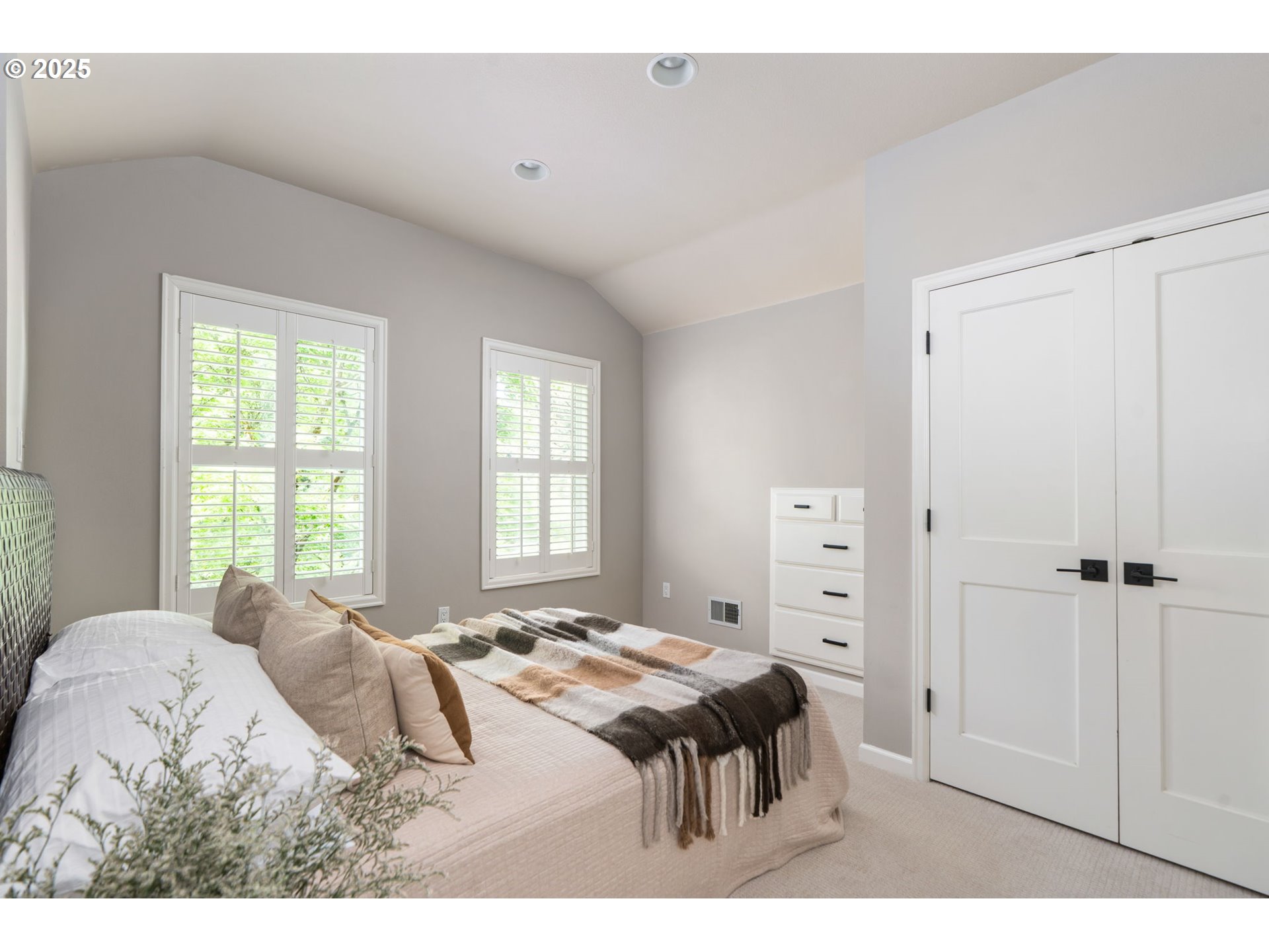 13740 Fielding Road Lake Oswego, OR 97034 - Photo 30 of 41 a bedroom with a bed and a window