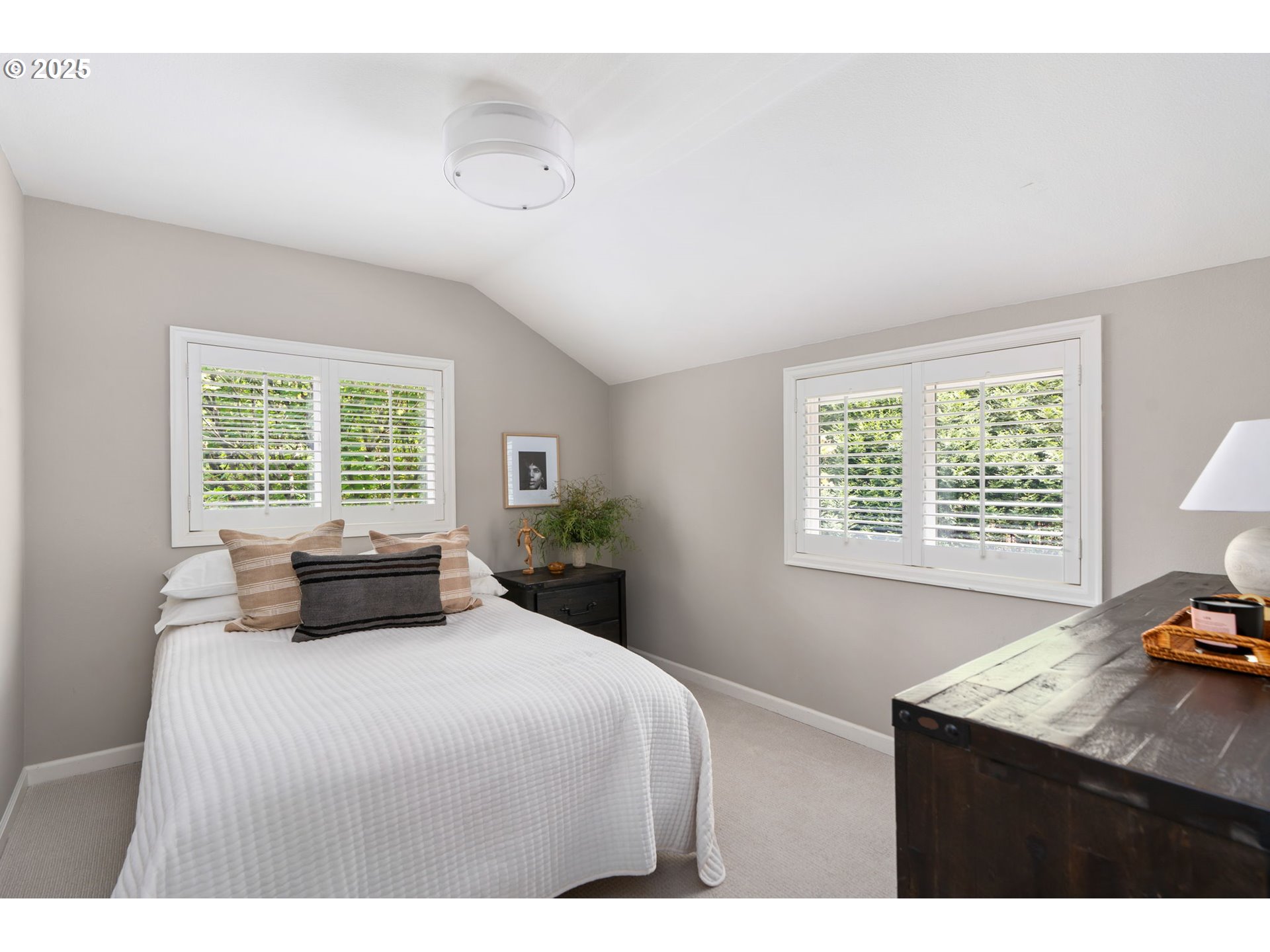 13740 Fielding Road Lake Oswego, OR 97034 - Photo 32 of 41 a bedroom with a bed and a window