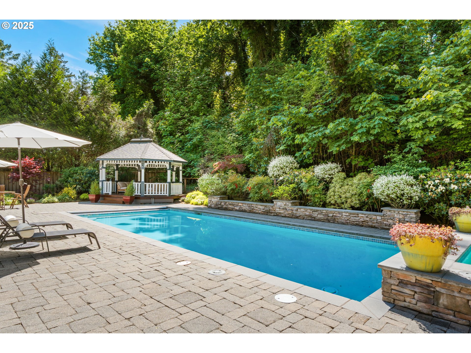 13740 Fielding Road Lake Oswego, OR 97034 - Photo 35 of 41 a front view of a house with swimming pool