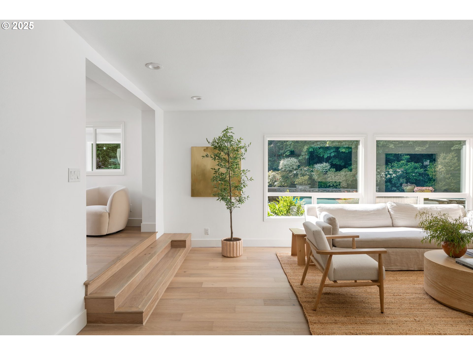 13740 Fielding Road Lake Oswego, OR 97034 - Photo 7 of 41 a living room with furniture and a large window