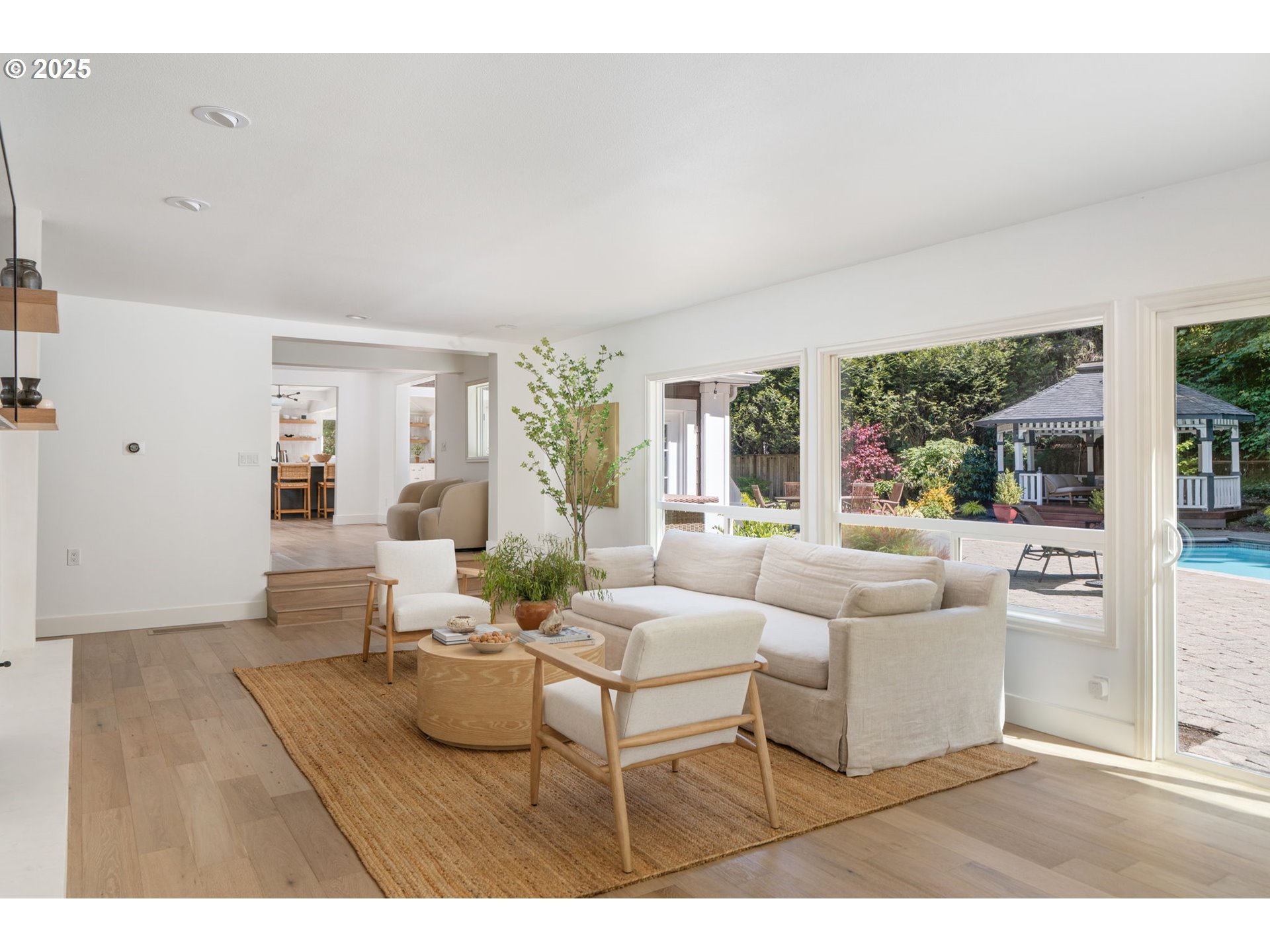 13740 Fielding Road Lake Oswego, OR 97034 - Photo 8 of 41 a living room with furniture and a large window