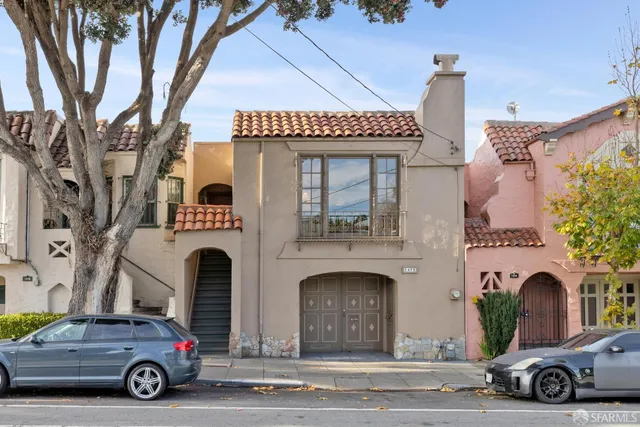 a car parked in front of a house