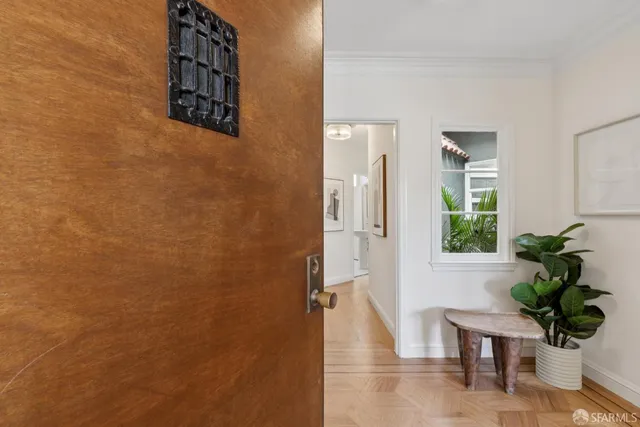 a view of a hallway with windows