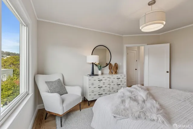 a view of a bedroom from a hallway