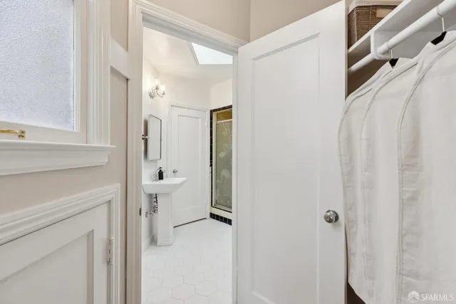 a bathroom with a bathtub and a sink