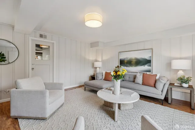 a bathroom with a sink vanity and mirror