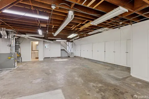 an aerial view of a house with outdoor space