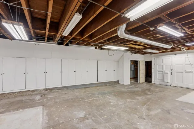 a view of a terrace with couches and wooden floor