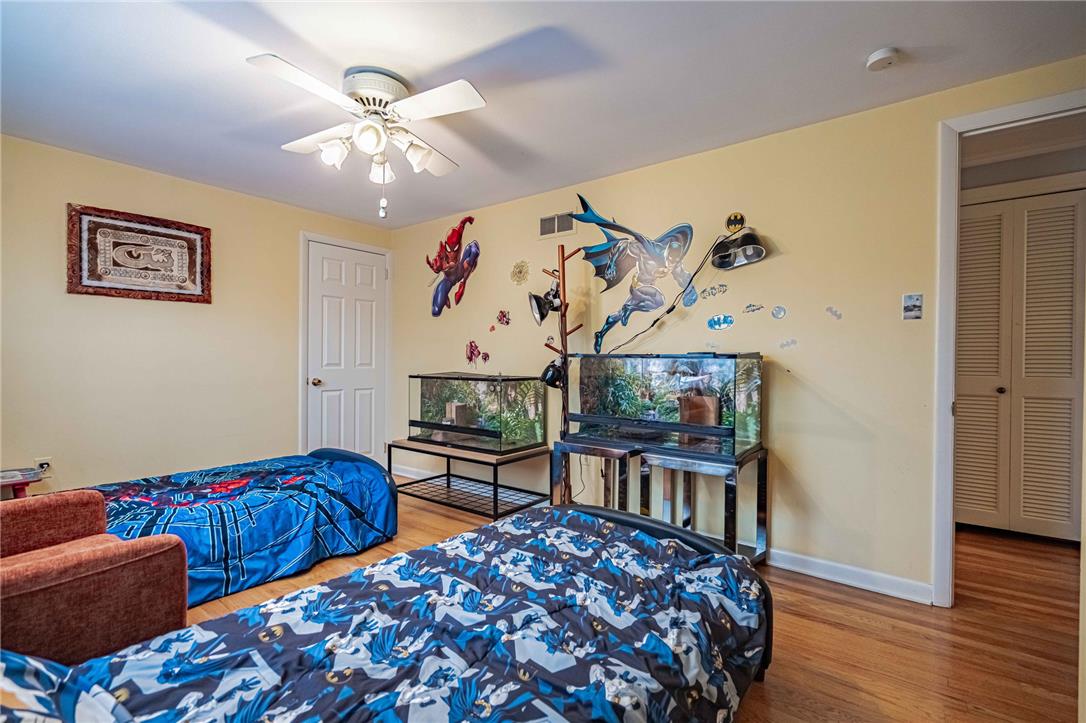 285 Bridle Path Road Bethlehem, PA 18017 - Photo 36 of 54 a bedroom with furniture and wooden floor