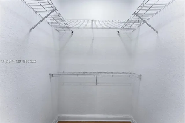 a view of a room with racks on the wall