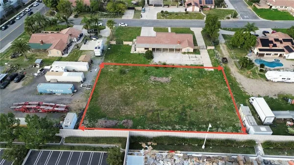 an aerial view of residential house with outdoor space