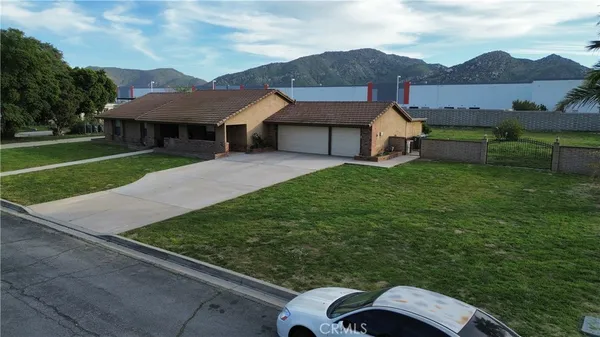 a aerial view of a house with garden