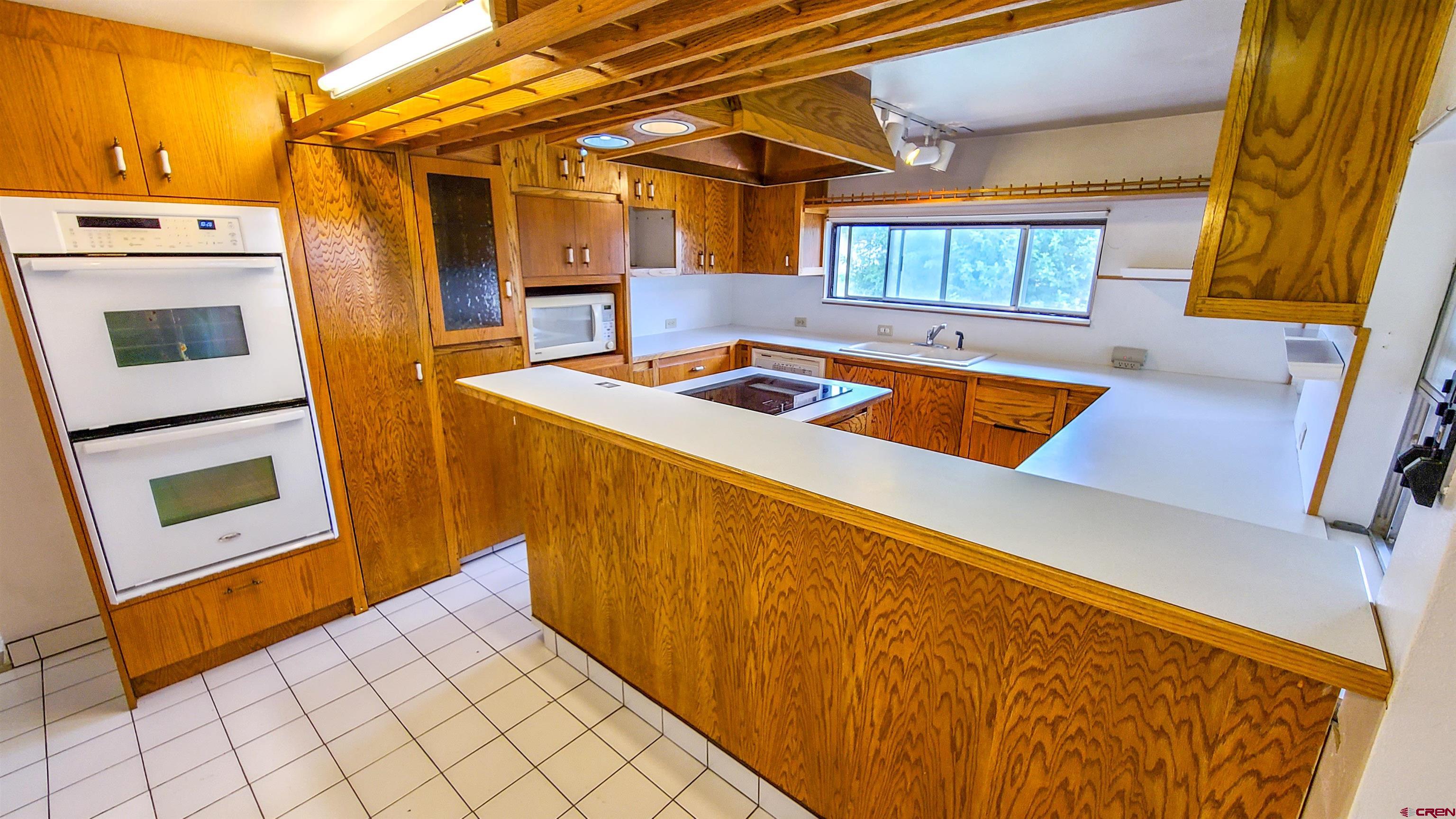 2916 East 7/8 Road Grand Junction, CO 81504 - Photo 12 of 35 a view of storage and utility room