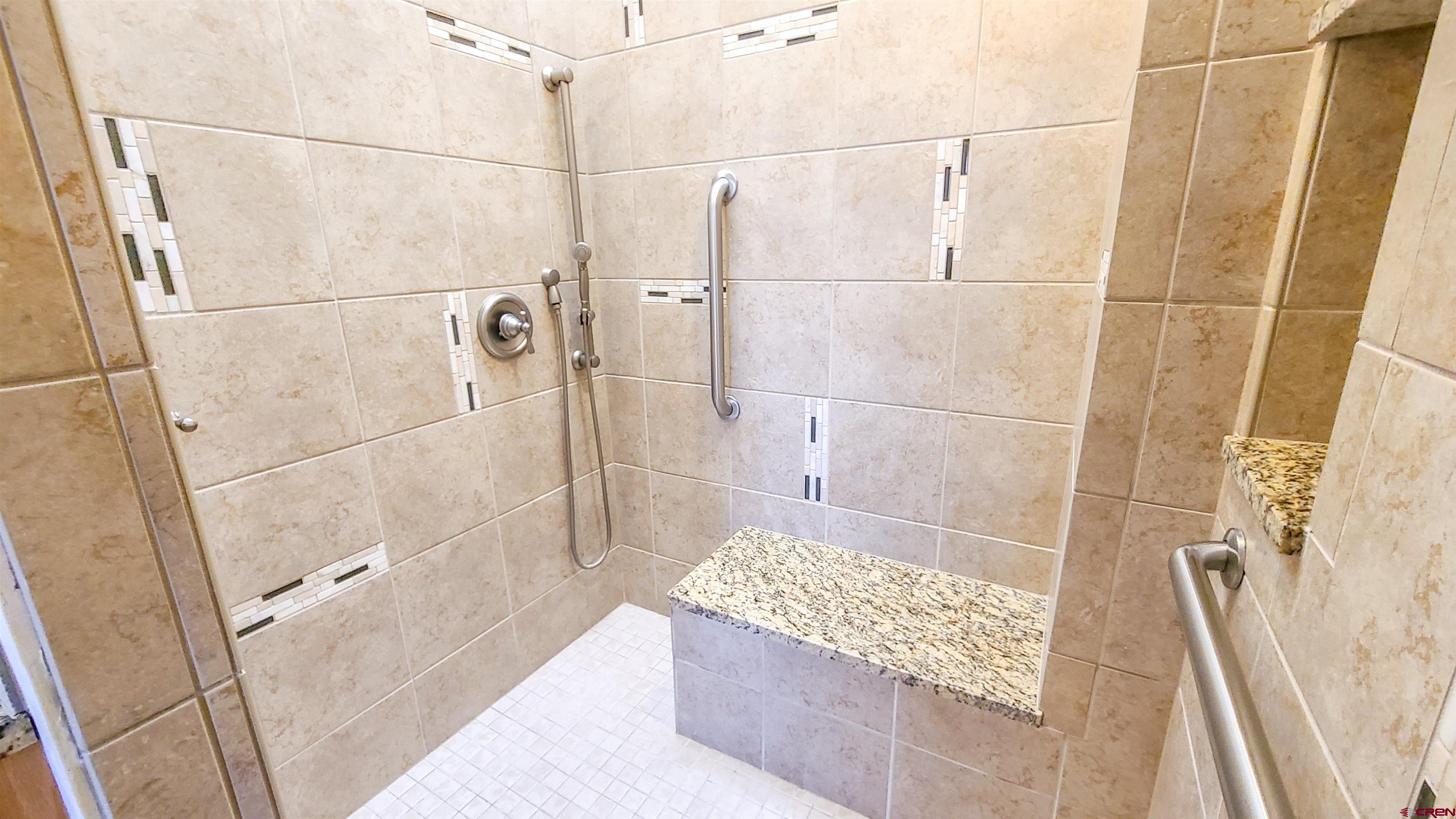 2916 East 7/8 Road Grand Junction, CO 81504 - Photo 18 of 35 a bathroom with a shower