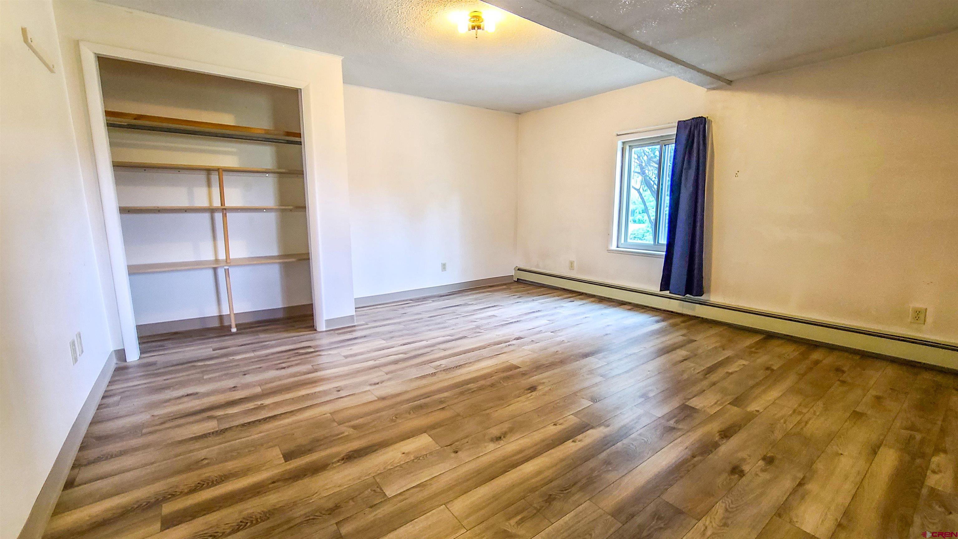 2916 East 7/8 Road Grand Junction, CO 81504 - Photo 23 of 35 a view of an empty room and window