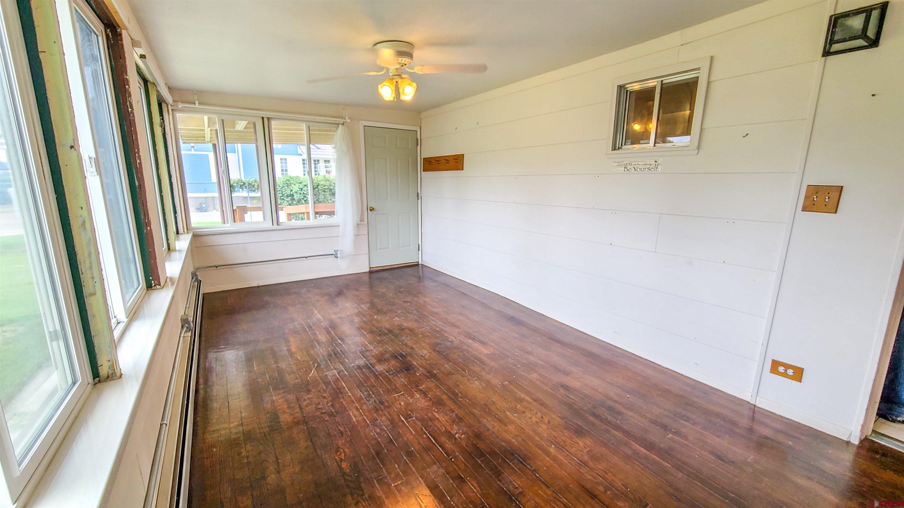 2916 East 7/8 Road Grand Junction, CO 81504 - Photo 27 of 35 a view of an entryway with wooden floor