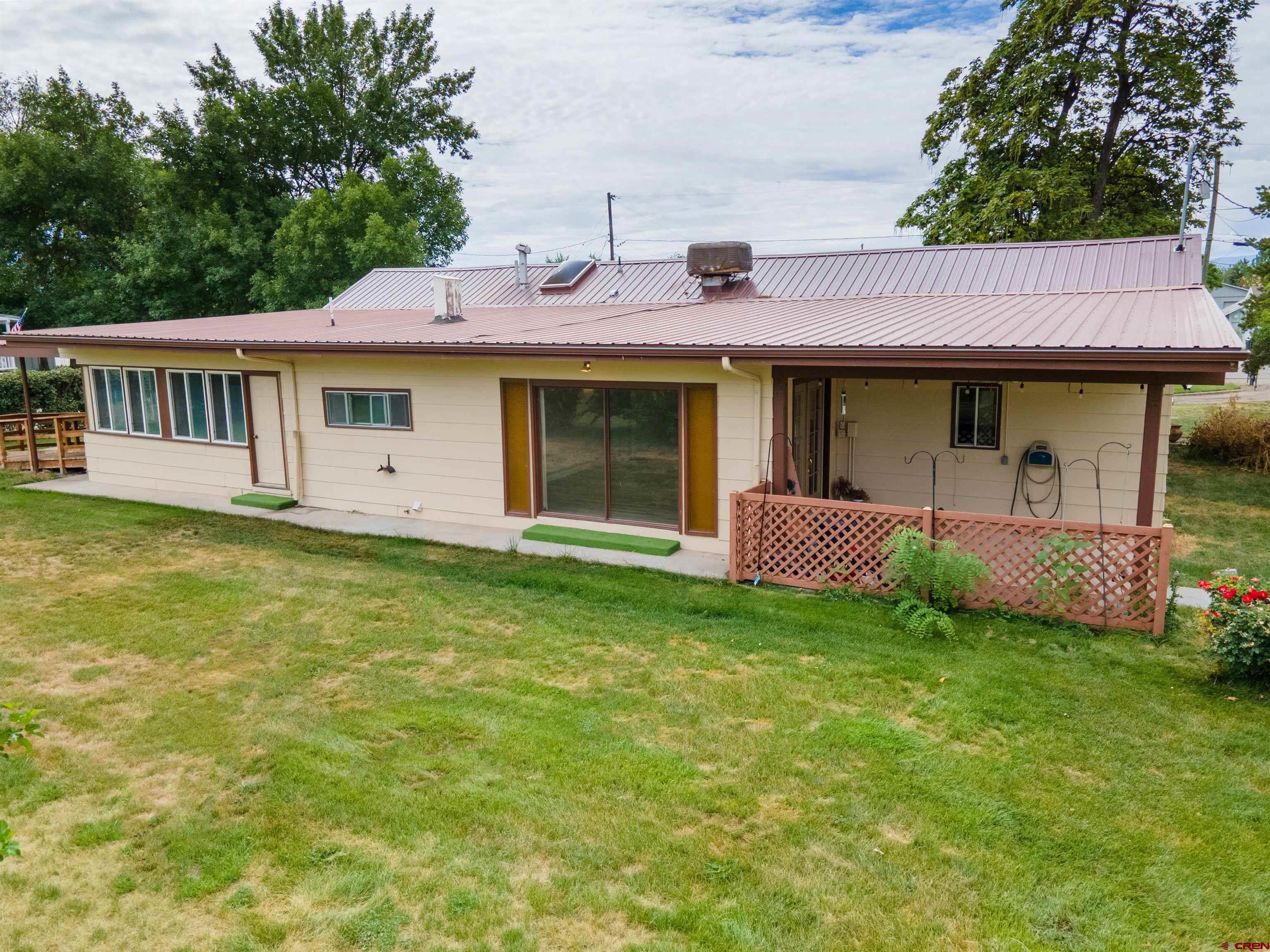 2916 East 7/8 Road Grand Junction, CO 81504 - Photo 30 of 35 a view of a house with a garden