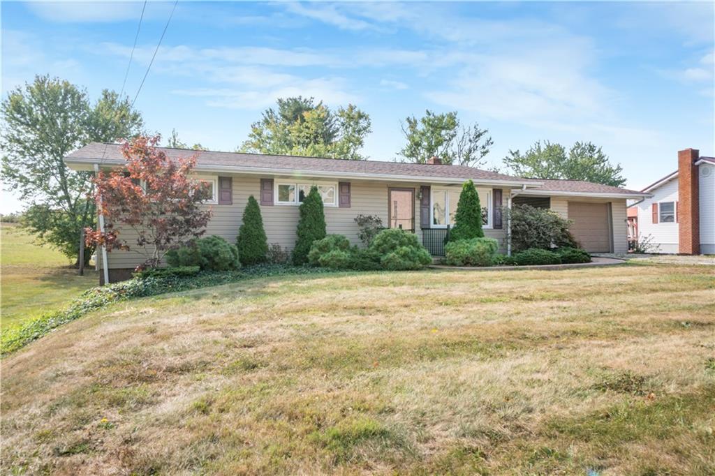 304 Balsinger Road Uniontown, PA 15401 - Photo 3 of 45 a view of a house with a backyard
