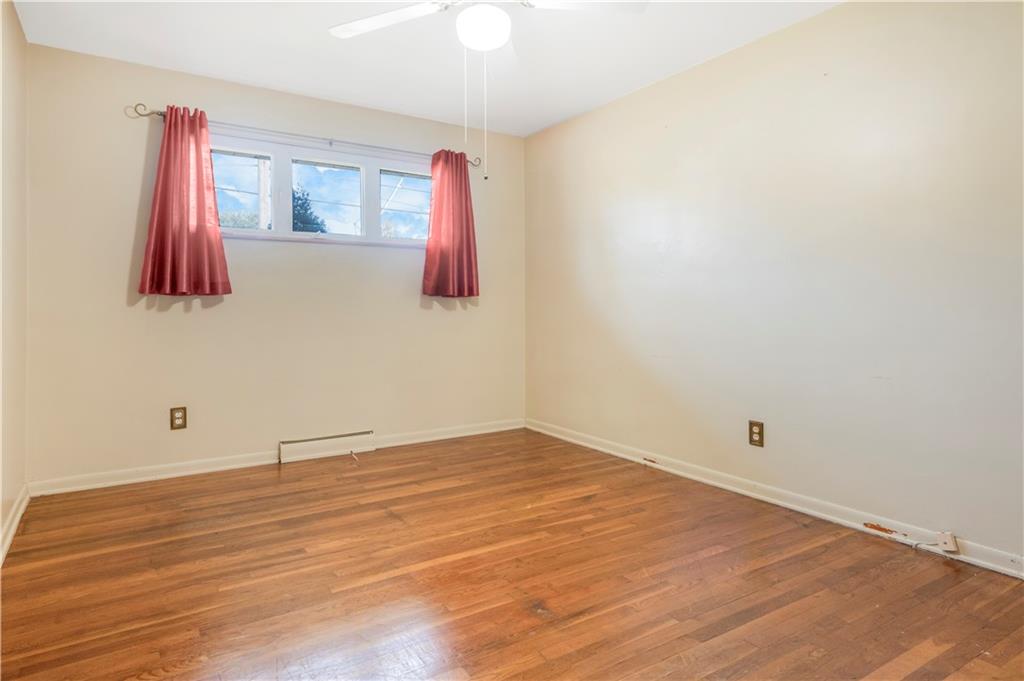 304 Balsinger Road Uniontown, PA 15401 - Photo 36 of 45 a view of a room with wooden floor and a table