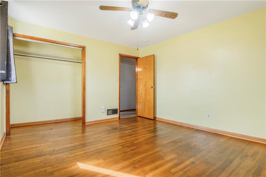 304 Balsinger Road Uniontown, PA 15401 - Photo 37 of 45 a view of an empty room with wooden floor