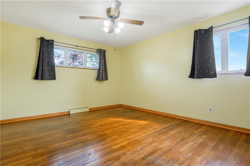 304 Balsinger Road Uniontown, PA 15401 - Photo 38 of 45 a view of a room with wooden floor and ceiling fan