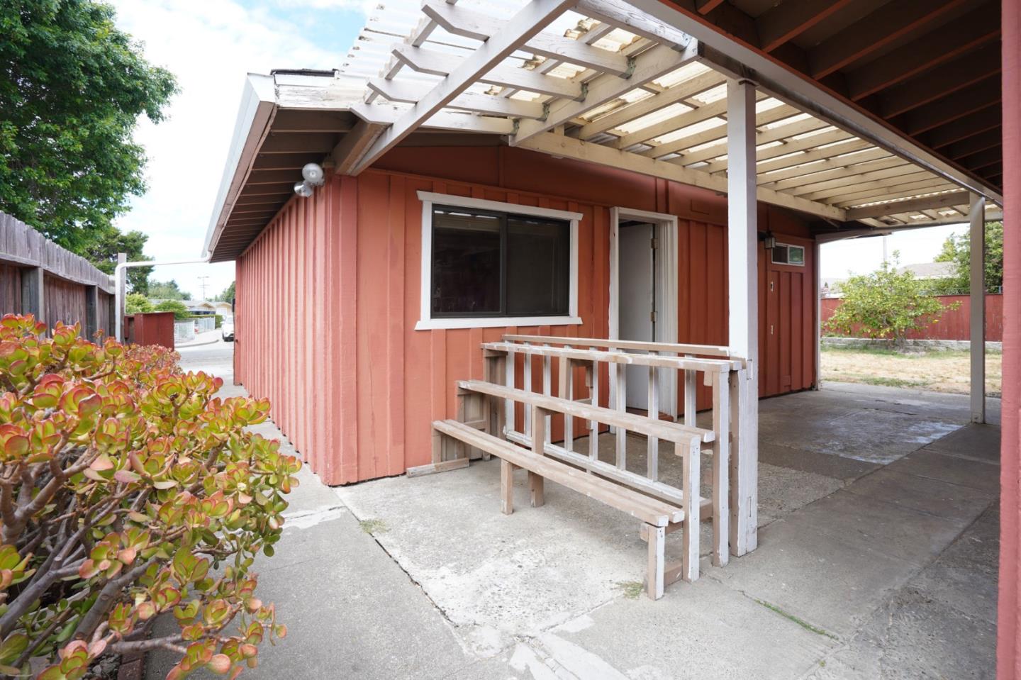 125 Rinaldo Drive Vallejo, CA 94589 - Photo 16 of 36 a view of a house with a yard and wooden fence