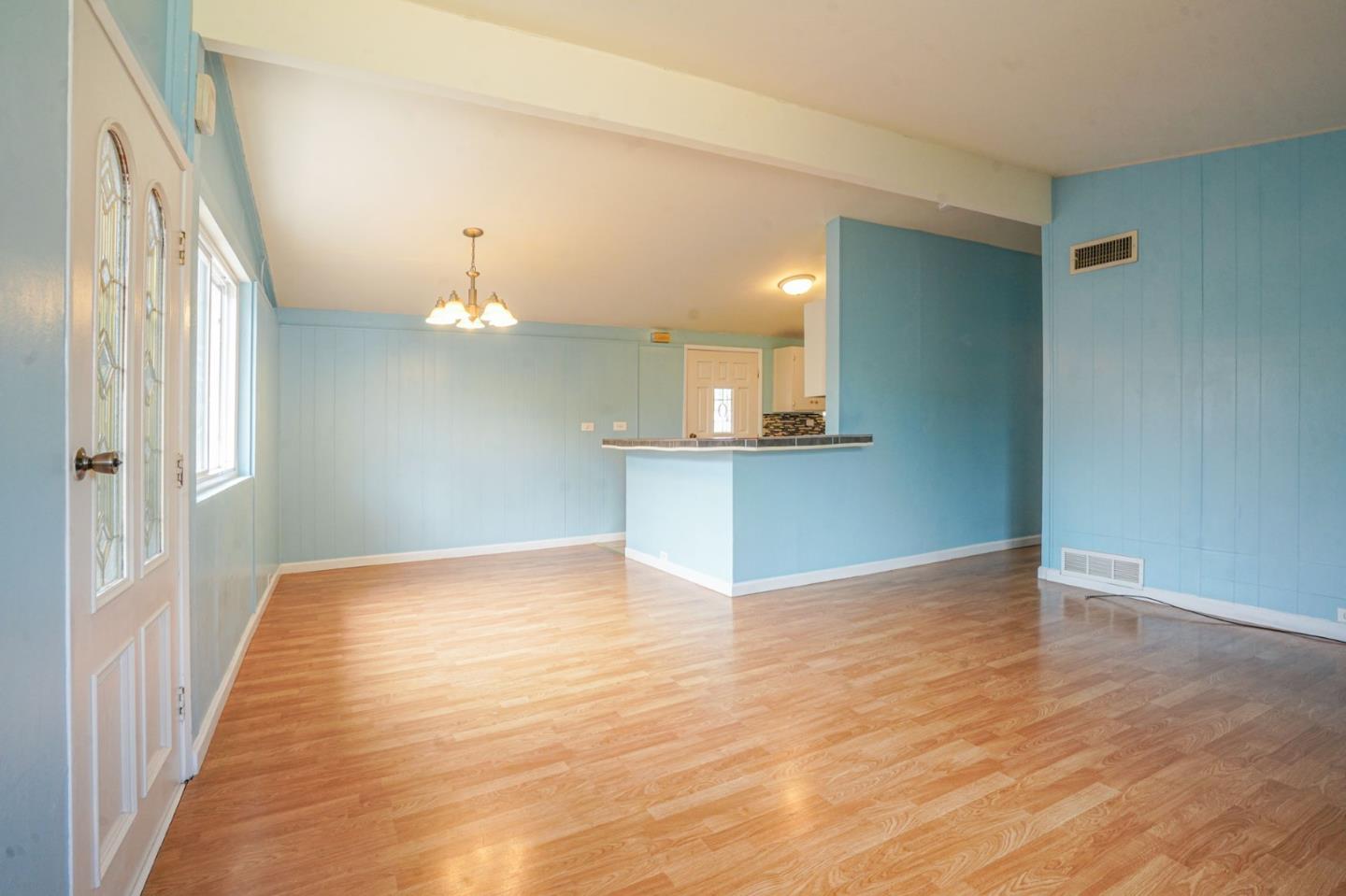 125 Rinaldo Drive Vallejo, CA 94589 - Photo 6 of 36 a view of a kitchen with wooden floor and a kitchen