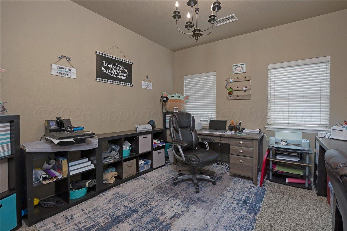 4801 Cedar Springs Trail Amarillo, TX 79119 - Photo 23 of 41 a view of a workspace with furniture