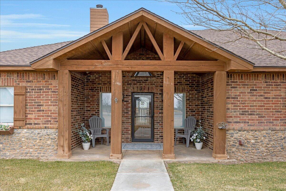 4801 Cedar Springs Trail Amarillo, TX 79119 - Photo 3 of 41 a front view of a house with garden