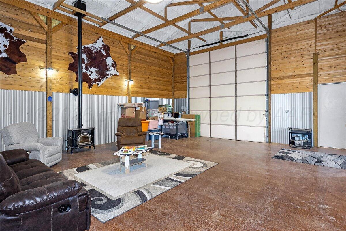 4801 Cedar Springs Trail Amarillo, TX 79119 - Photo 35 of 41 a view of a workspace with furniture and a window